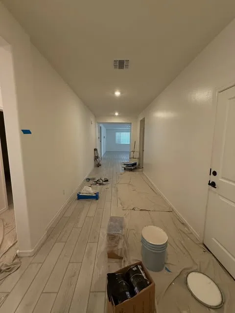 Floors covered and masked before a coat goes on